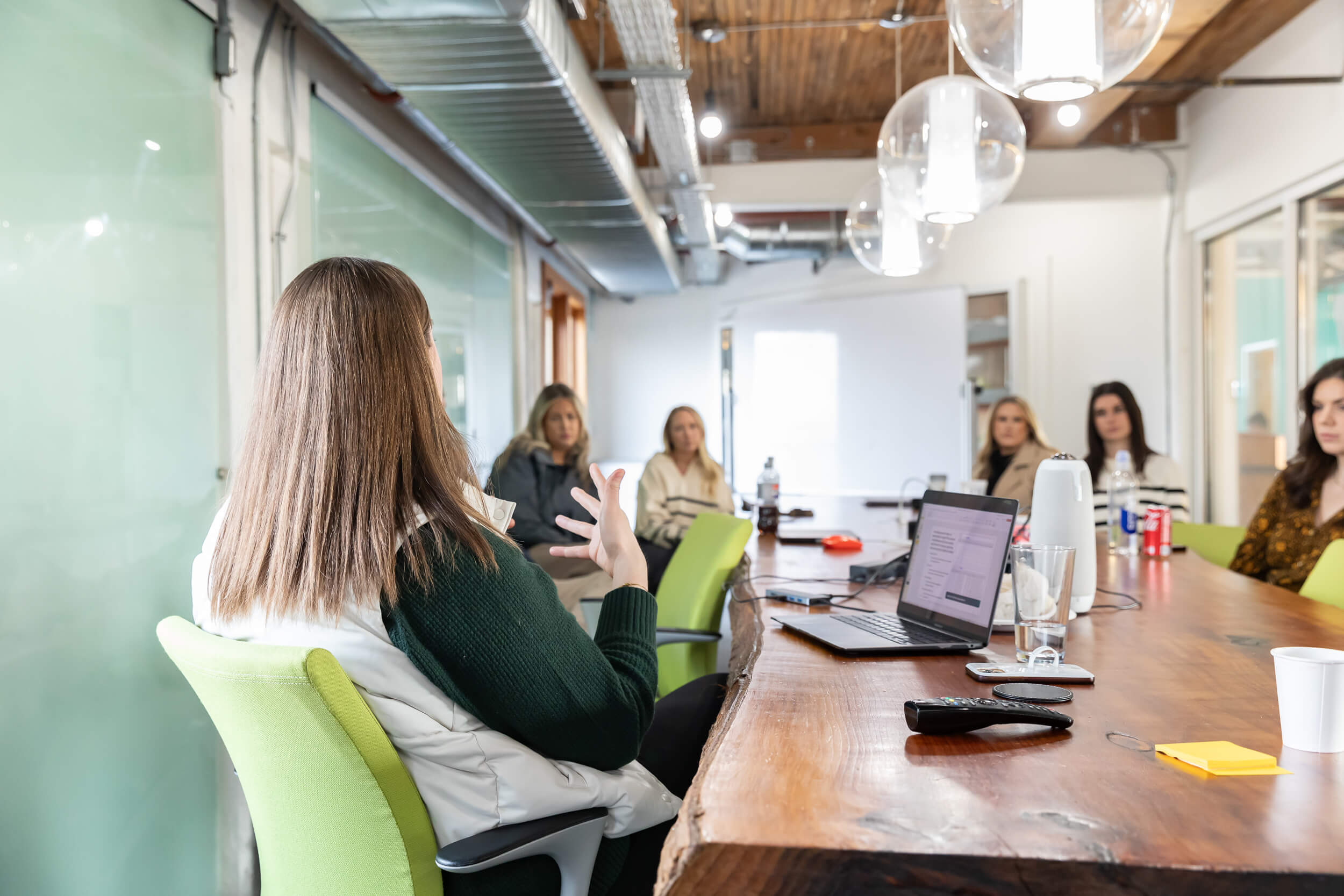 Brandwoven team sitting around a conference table
