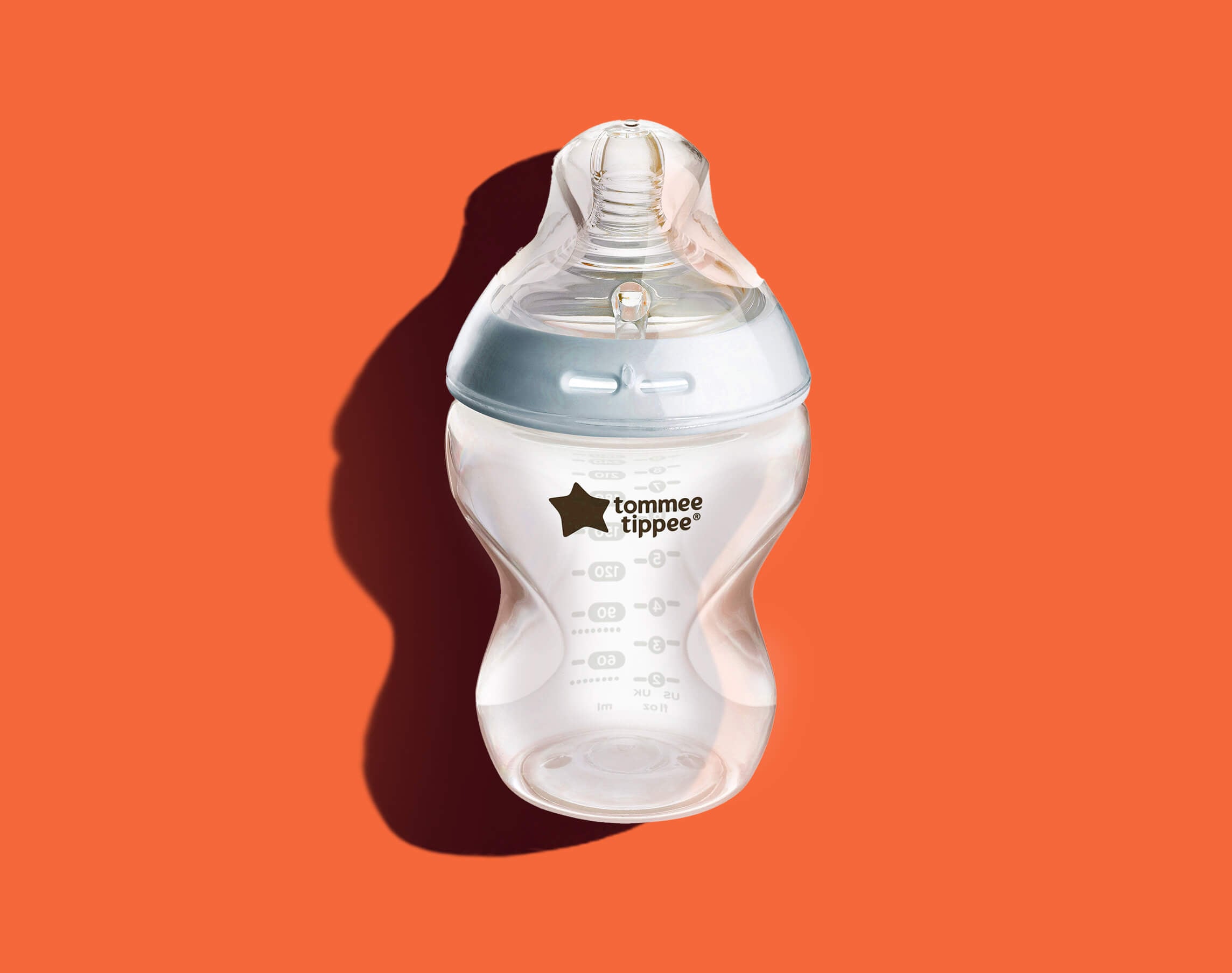 Tommee Tippee cup on an orange background